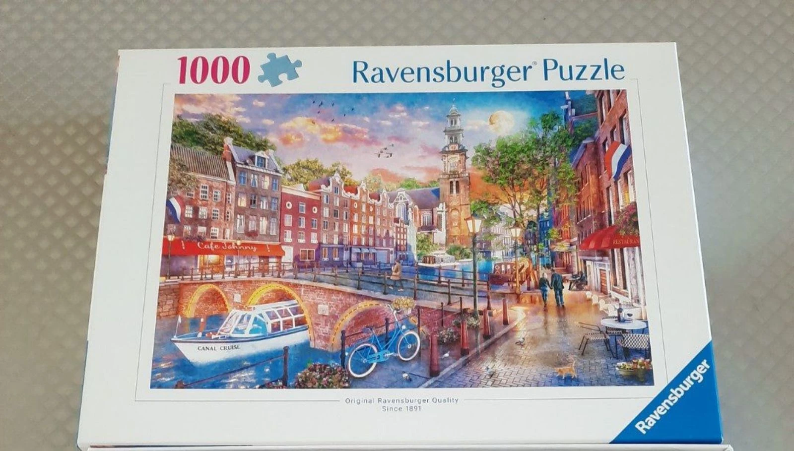 Puzzle Ravensburger 1000 pièces – Canal d’Amsterdam au coucher du soleil – Complet